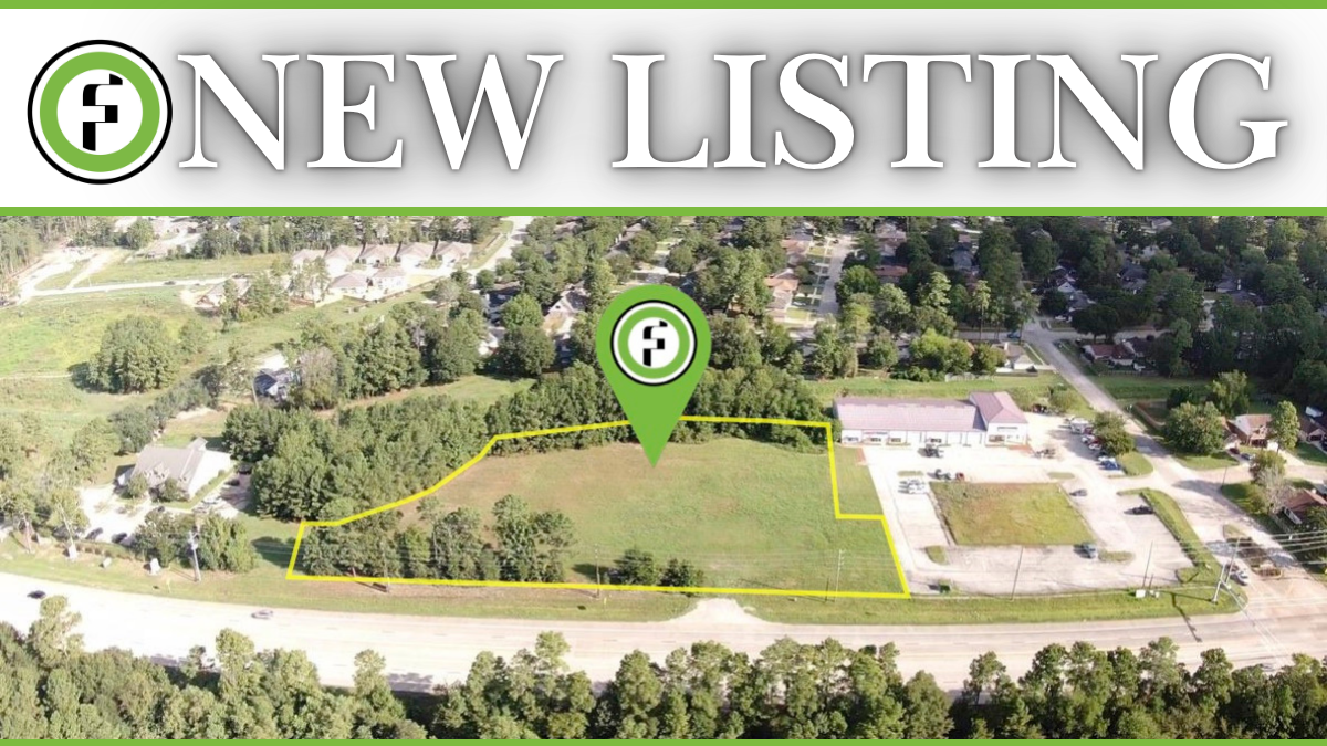 3.46 acres of commercial land for sale at 977 N Loop 336 E in Conroe TX